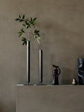 pair of minimal metal scandinavian vases by audo copenhagen