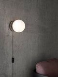 Audo Copenhagen TR Bulb Table / Wall Lamp, Grey Marble in a styled interior
