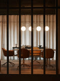 Audo Copenhagen Harbour Arm Chair, Dining Height, Upholstered with the Snaregade Dining Table