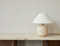 torso table lamp in sand by audo copenhagen