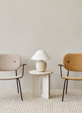 traditional scandinavian table lamp with minimalist armchairs