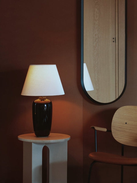 Audo Copenhagen Torso Table Lamp with the Androgyne Side Table and the Co Lounge Chair