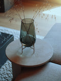 echasse vase designed by theresa rand on a marble end table by audo copenhagen