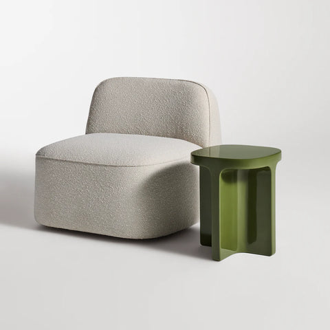 Small Talk Tall Side Table by Blu Dot in Olive glass fiber reinforced concrete, styled with lounge chair, 3/4 view
