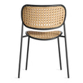 Made You Look Outdoor Chair by Blu Dot in Oblivion with woven plastic rattan back, front view