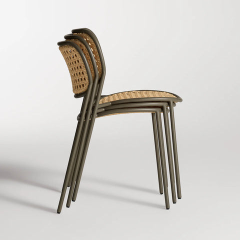 Made You Look Outdoor Chair by Blu Dot in Dark Olive, three chairs stacked, side view