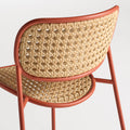 Made You Look Outdoor Chair by Blu Dot, woven plastic rattan back and seat detail, Tomato frame