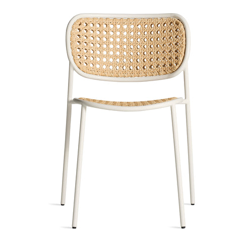 Made You Look Outdoor Chair by Blu Dot in White with woven plastic rattan back, front view