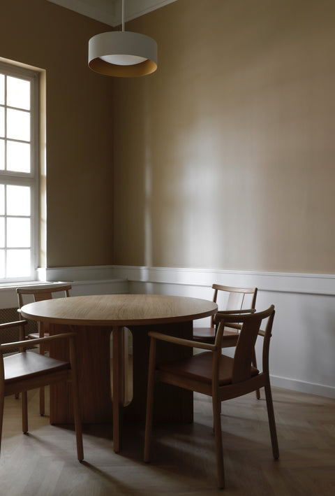 natural oak merkur dining chair with arms and dakar leather seat designed by Skogstad & Wærnes for audo copenhagen