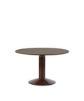 midst table by muuto in dark oak tabletop and dark red base 