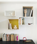 Muuto Mini Stacked Storage System in contemporary living room, showcasing modular storage and Scandinavian interior design