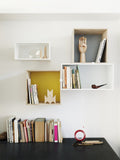 Muuto Mini Stacked Storage System in contemporary living room, showcasing modular storage and Scandinavian interior design