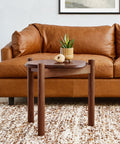 modern walnut end table and cognac leather sofa by canadian furniture company gus modern