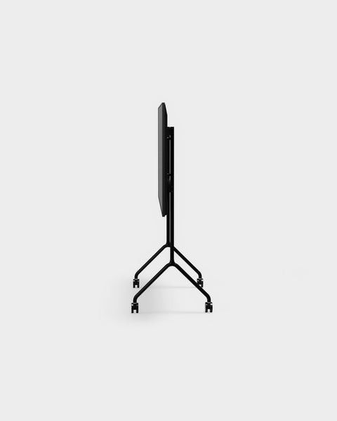 Pedestal Moon Light TV Stand in Charcoal, compact steel TV stand on wheels, seen edge on from the side without a screen fitted