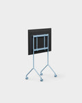 Pedestal Moon Light TV Stand in Powder Blue, compact steel TV stand on wheels, seen from behind showing the VESA bracket