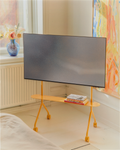 Pedestal Moon Light Shelf in Apricot, steel shelf for the Moon Light TV stand, fitted to an Apricot stand in a room with a bed