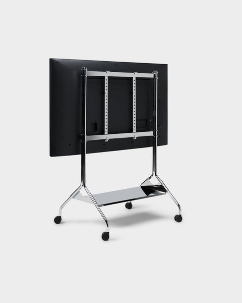 Pedestal Moon Tall TV Stand in Chrome, seen from behind with a screen fitted, on a plain background