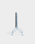 Pedestal Moon TV Stand in Powder Blue, rolling steel TV stand, seen from behind without a screen fitted