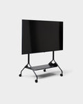 Pedestal Moon Tray Shelf in Charcoal, steel tray shelf for a TV stand, fitted to a Charcoal Moon stand holding a screen
