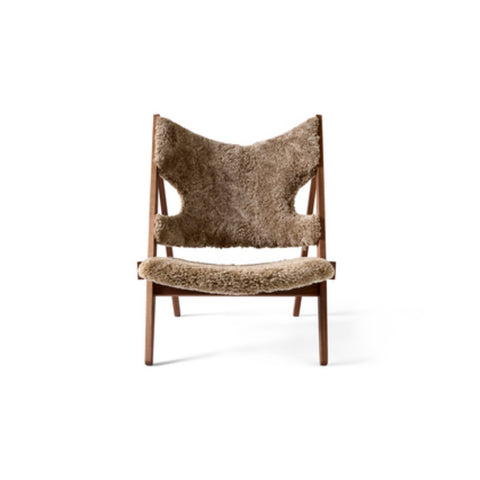 Audo Copenhagen Knitting Lounge Chair, Sheepskin in Walnut and Sheepskin Sahara, packshot on white