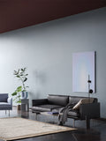 Stylish Muuto Outline 3-seater sofa with neutral upholstery in elegant lounge space