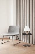 minimalist scandinavian lounge chair with sledge metal base by fredericia 
