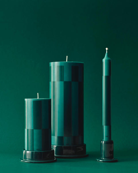 HAY Column Candle, Large, Green and Dark Green, stearin pillar candles, two sizes with a taper on holders against a green backdrop