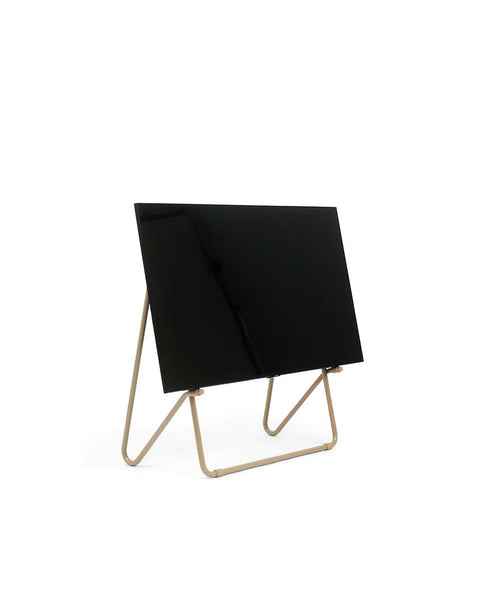 Pedestal Bloom TV Stand in Sandstorm, easel style TV stand holding a flat screen TV, on a plain white background