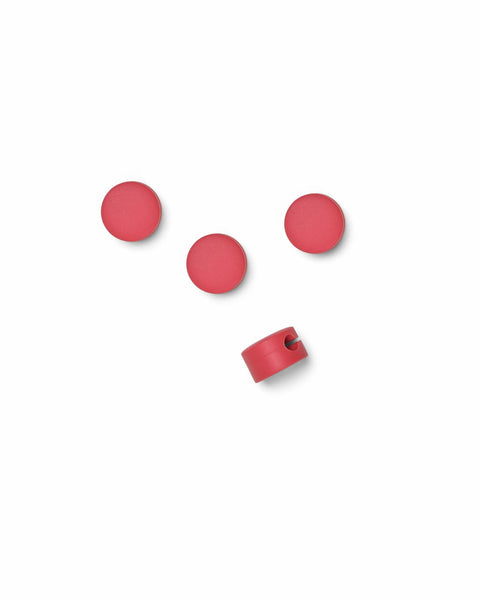 Pedestal Cable Dots in Burnin' Red, silicone cable dots with a mounting clip, on a plain white background