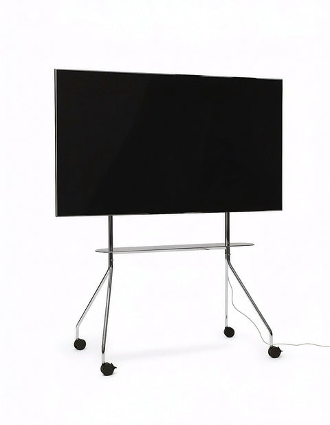 Pedestal Moon PRO TV Stand in Chrome, mobile rolling TV stand with shelf holding a flat screen TV, on a plain white background