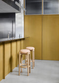 minimalist upholstered scandinavian bar stools by danish furniture company fredericia 