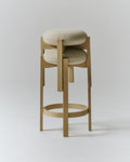 Stackable Fredericia Pioneer bar stools in natural oak with upholstered seats and circular footrest, Scandinavian modern style