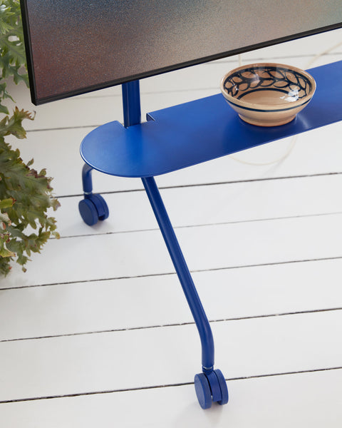 Pedestal Moon Shelf in Ultra Marine, steel shelf for a TV stand, fitted to an Ultra Marine stand with a bowl on it