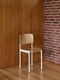 minimalist wood dining chair with white metal frame by fredericia