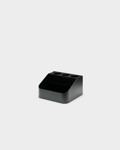 Pedestal Power Bar Tray in Charcoal, steel power bar holder, seen from the front with the opening facing the camera