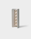 Pedestal Power Shell in Pearl, steel power beam enclosure, standing upright with a power beam inside, sold separately