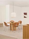 set of Trinidad dining chairs and islets dining table in a scandinavian dining room designed by fredericia furniture