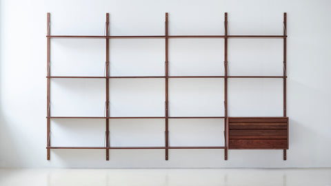 DK3 Royal System Shelving 4 Bay with Drawers in Walnut and Brass, walnut wall shelving, fourteen shelves and a drawer cabinet, front view