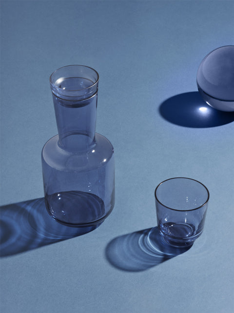 raise glasses by muuto in dark blue