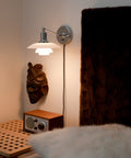 ph 2/1 wall mounted lamp above a bedside table