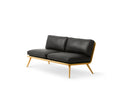 Fredericia Spine Lounge Sofa three quarter view in black leather with oak base minimalist product shot
