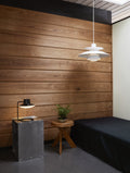 woodslat wall in bedroom with ph5 pendant and aj oxford table lamp for louis poulsen