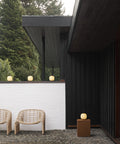 minimalist exterior with modern brass portable lamps