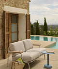 muuto outdoor scandinavian 2 seater sofa by the pool 