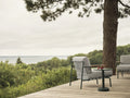 scandinavian outdoor lounge chair in nature lifestyle image 