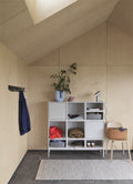 Sleek Muuto Coil Coat Rack, stylish storage solution for coats and accessories in contemporary home