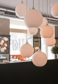 white scandinavian bubble pendant designed by Vilhelm Wohlert for Louis Poulsen