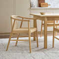Gus* Modern Strand Dining Chair in Royal Oak with upholstered fabric at Scandinavian inspired dining table