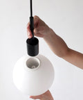 tr bulb pendant in black by audo copenhagen