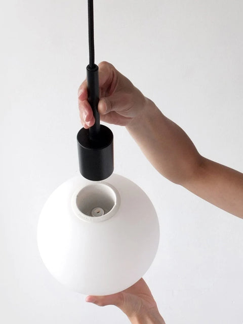 tr bulb pendant in black by audo copenhagen